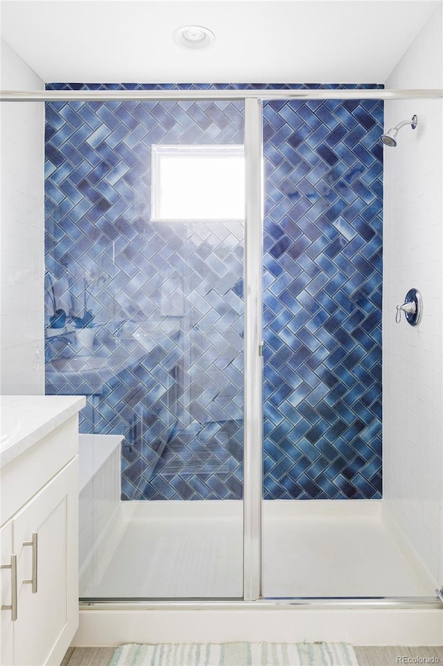 8917 Yates Dr, Westminster, CO 80031 - full bathroom with a stall shower and vanity
