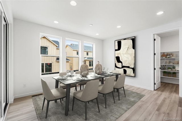 8850 Moonshimmer Trl, Littleton, CO 80125 - dining space featuring light wood finished floors and recessed lighting