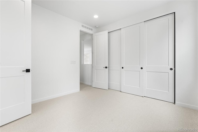 8850 Moonshimmer Trl, Littleton, CO 80125 - unfurnished bedroom featuring carpet floors, recessed lighting, and a closet