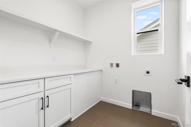 8850 Moonshimmer Trl, Littleton, CO 80125 - laundry room featuring electric dryer hookup, hookup for a washing machine, and cabinet space