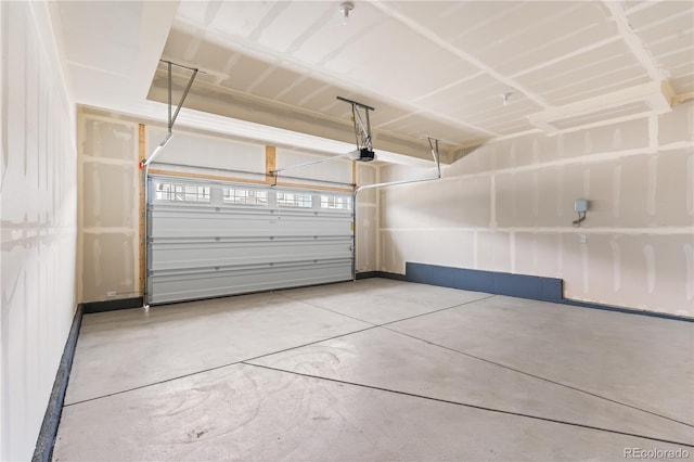 8850 Moonshimmer Trl, Littleton, CO 80125 - garage featuring a garage door opener