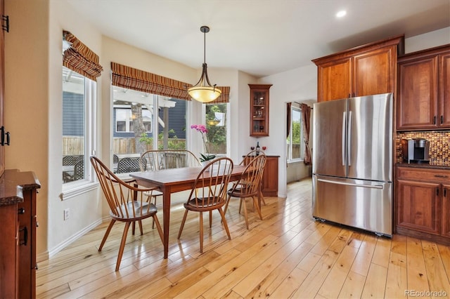 9478 Burgundy Cir, Highlands Ranch, CO 80126 - dining space featuring light wood finished floors