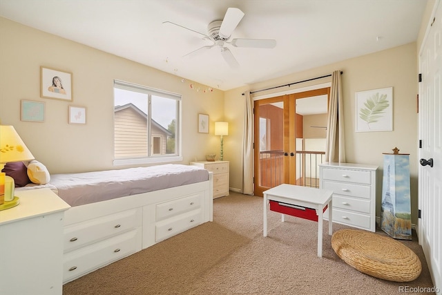 9478 Burgundy Cir, Highlands Ranch, CO 80126 - bedroom featuring french doors, light carpet, ceiling fan, and access to exterior