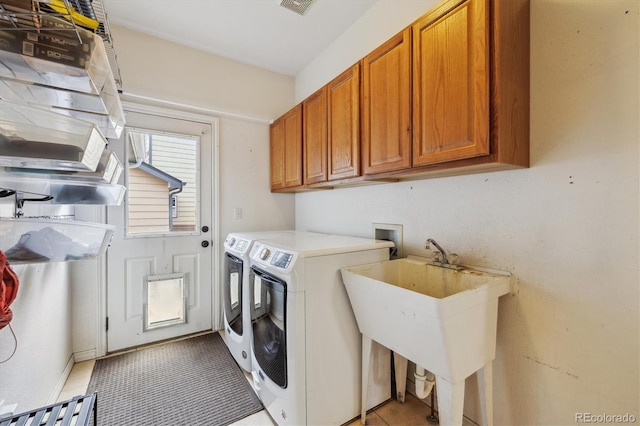 9478 Burgundy Cir, Highlands Ranch, CO 80126 - laundry area featuring cabinet space and independent washer and dryer