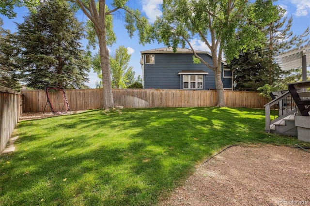 9478 Burgundy Cir, Highlands Ranch, CO 80126 - fenced backyard with stairway
