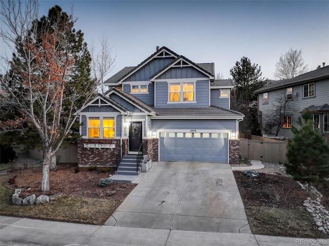 craftsman-style house featuring a garage