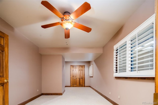2409 E Cedar Ave, Denver, CO 80209 - spare room featuring light carpet and a ceiling fan