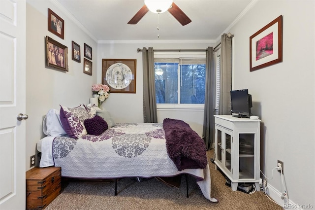 bedroom featuring ornamental molding, ceiling fan, and carpet flooring