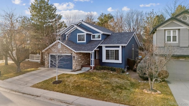 view of front of home featuring a garage and a front yard