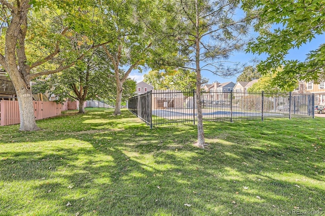 view of yard with fence
