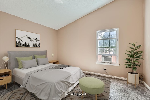 carpeted bedroom featuring cooling unit and vaulted ceiling