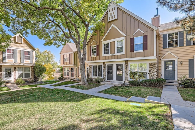 view of property with a front lawn