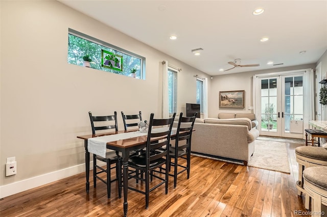 1916 S Elati St, Denver, CO 80223 - dining area featuring wood-type flooring, recessed lighting, and french doors