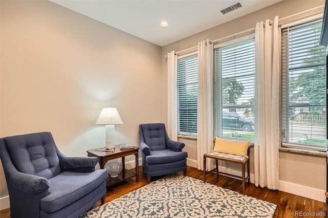 1916 S Elati St, Denver, CO 80223 - living area featuring healthy amount of natural light, dark wood-style flooring, and recessed lighting