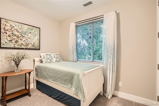 1916 S Elati St, Denver, CO 80223 - carpeted bedroom featuring baseboards