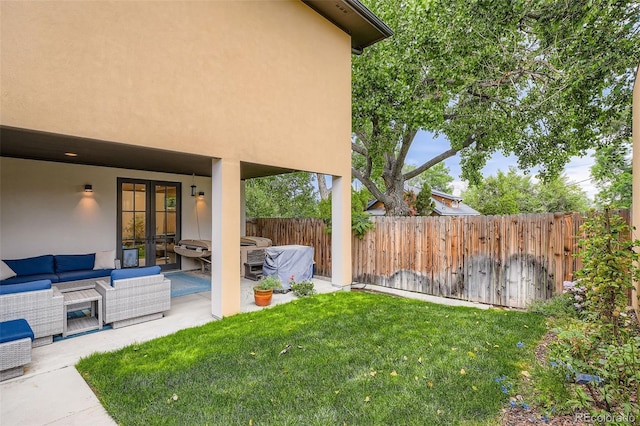1916 S Elati St, Denver, CO 80223 - fenced backyard with outdoor lounge area and a patio