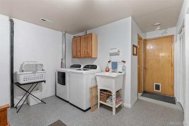 2230 County Road 72, Bailey, CO 80421 - clothes washing area featuring cabinet space, washing machine and clothes dryer, and baseboards