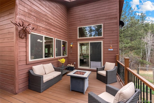 2230 County Road 72, Bailey, CO 80421 - deck with an outdoor living space with a fire pit