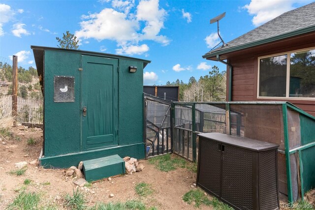 2230 County Road 72, Bailey, CO 80421 - view of shed featuring fence