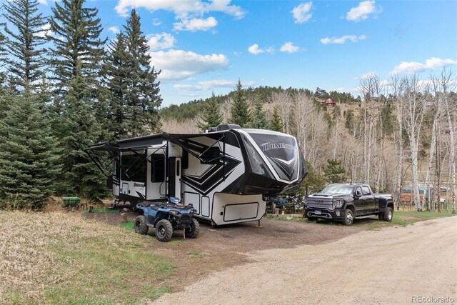 2230 County Road 72, Bailey, CO 80421 - view of front of property with a wooded view
