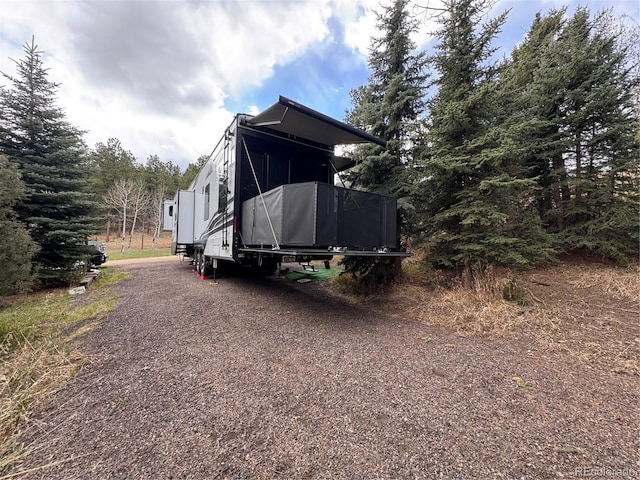 2230 County Road 72, Bailey, CO 80421 - view of property exterior featuring driveway