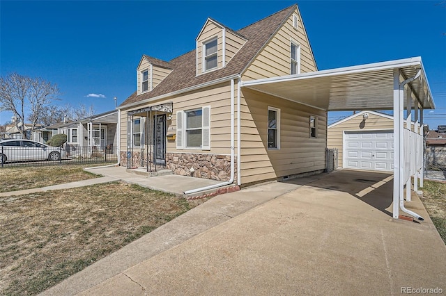 view of front of house with stone siding, a detached garage, fence, an outdoor structure, and concrete driveway