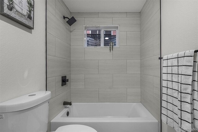 full bathroom with shower / tub combination and toilet
