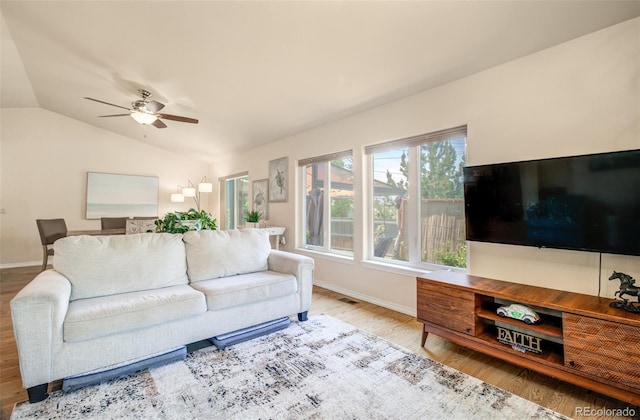 418 Hilltop Cir, Colorado Springs, CO 80905 - living area with vaulted ceiling, wood finished floors, and a ceiling fan
