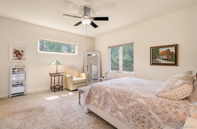 418 Hilltop Cir, Colorado Springs, CO 80905 - carpeted bedroom with baseboards and a ceiling fan