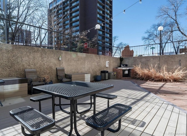 2 Adams St Unit 1507, Denver, CO 80206 - wooden terrace with outdoor dining space