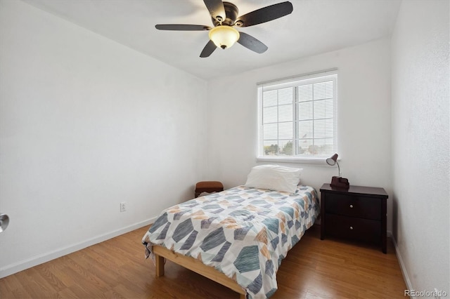 bedroom featuring ceiling fan and wood-type flooring