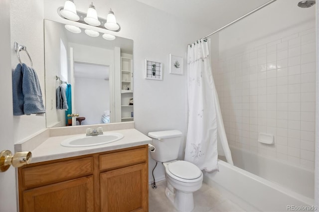 full bathroom with tile patterned floors, toilet, vanity, and shower / bath combination with curtain