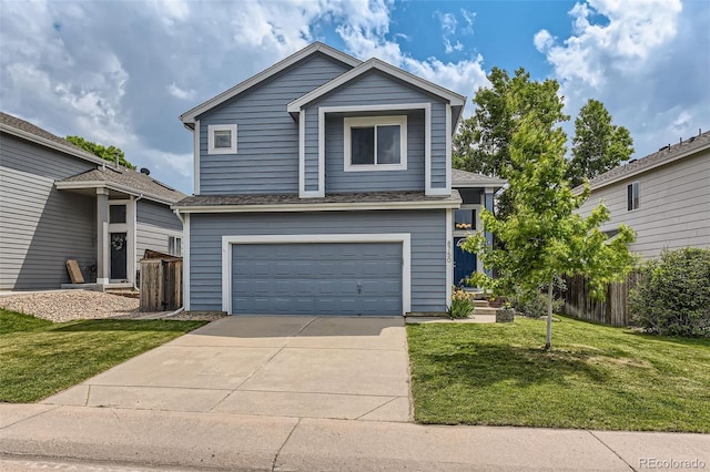 8750 Redwing Ave, Littleton, CO 80126 - view of front of house featuring a garage, concrete driveway, and a shingled roof