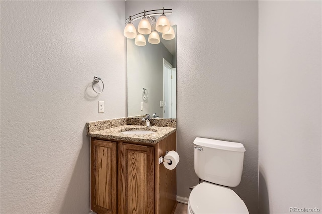 8750 Redwing Ave, Littleton, CO 80126 - bathroom with toilet and vanity