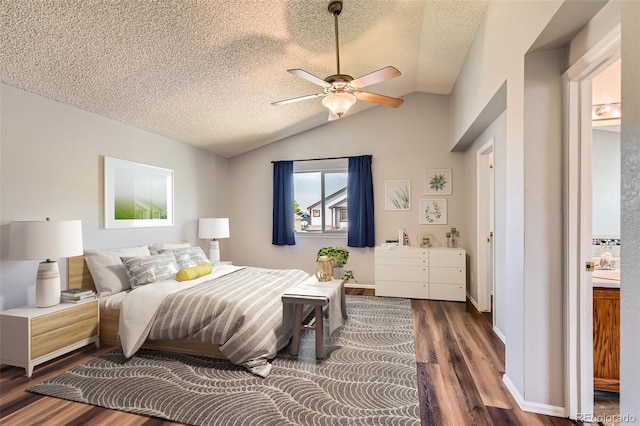 8750 Redwing Ave, Littleton, CO 80126 - bedroom with dark wood-type flooring, lofted ceiling, a textured ceiling, and a ceiling fan