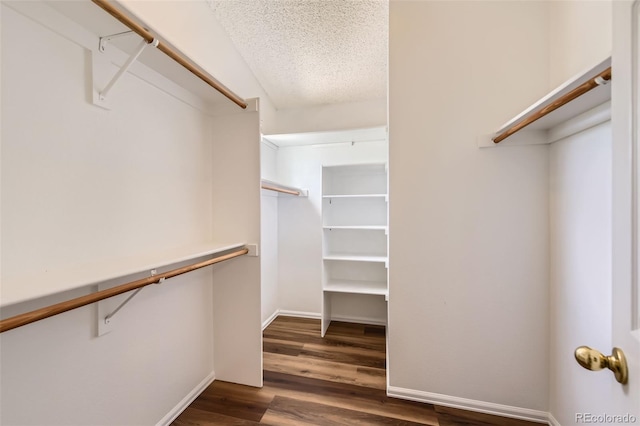 8750 Redwing Ave, Littleton, CO 80126 - walk in closet featuring wood finished floors