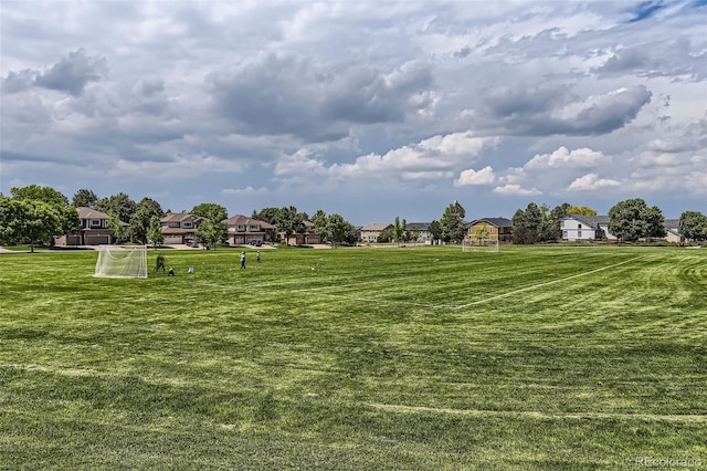 8750 Redwing Ave, Littleton, CO 80126 - surrounding community featuring a residential view and a sport area