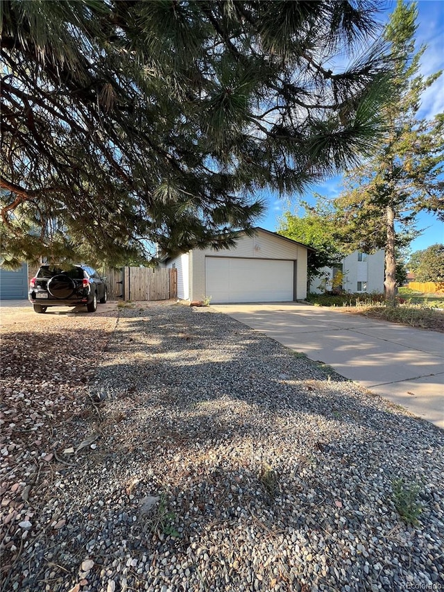 view of front of house featuring an outbuilding and a garage