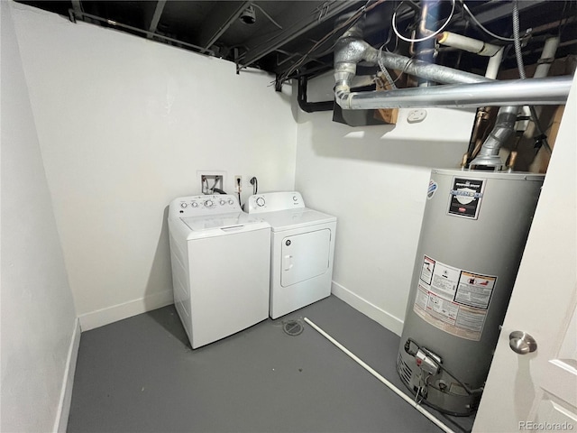 15908 E Flora Pl, Aurora, CO 80013 - laundry area featuring water heater, washer and clothes dryer, and baseboards
