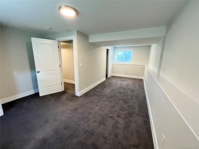 15908 E Flora Pl, Aurora, CO 80013 - unfurnished bedroom featuring dark colored carpet and baseboards