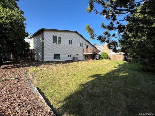 15908 E Flora Pl, Aurora, CO 80013 - rear view of property featuring a wooden deck and central air condition unit
