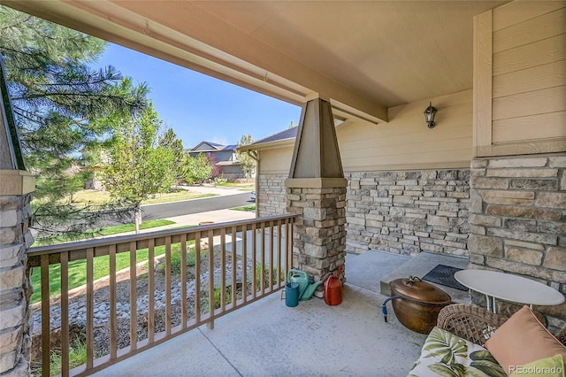 balcony featuring a porch