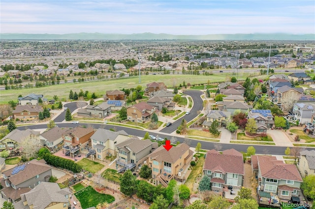 bird's eye view with a residential view and a mountain view