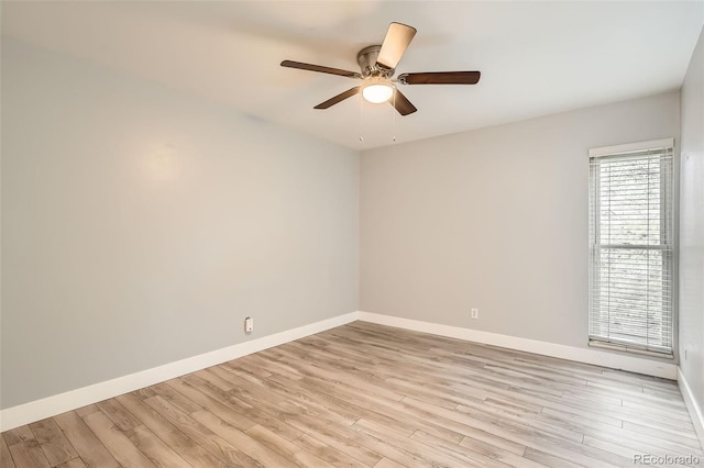 unfurnished room with light wood-type flooring, baseboards, and ceiling fan