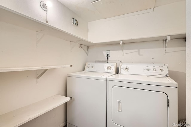 laundry room featuring washer and dryer