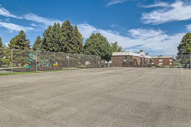 uncovered parking lot with fence