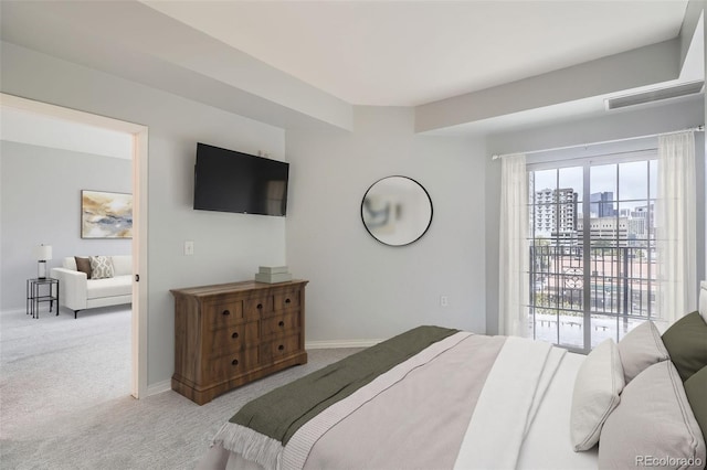 bedroom with carpet floors and baseboards