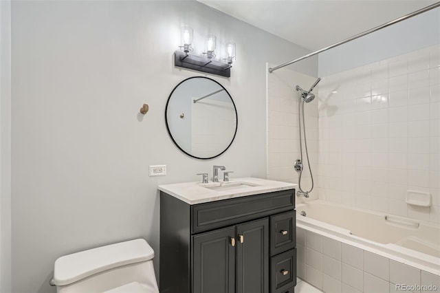 full bath with toilet, vanity, and shower / bathtub combination