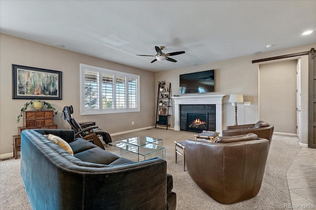 carpeted living room featuring ceiling fan