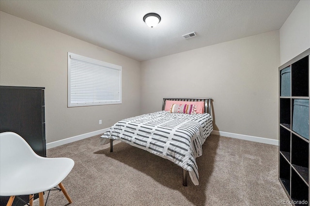 bedroom featuring carpet